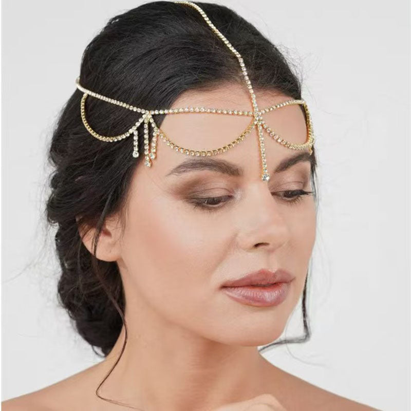 Bridal water diamond forehead chain head accessory by LUNIVA CARE USA worn on dark hair
