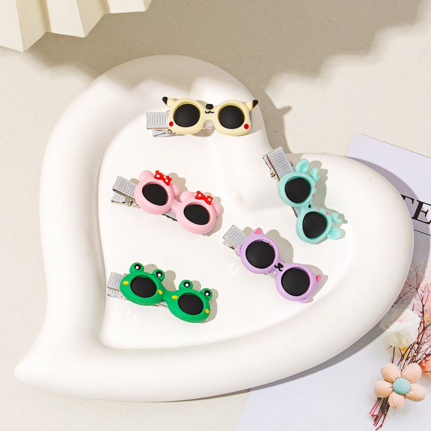 LUNIVA CARE USA cartoon glasses hairpins for girls in various animal designs on a white heart tray