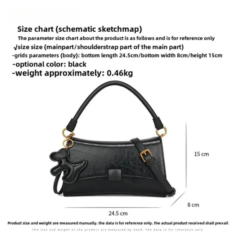 Small black purse with dog charm by LUNIVA CARE USA featuring shoulder strap and armpit bag design