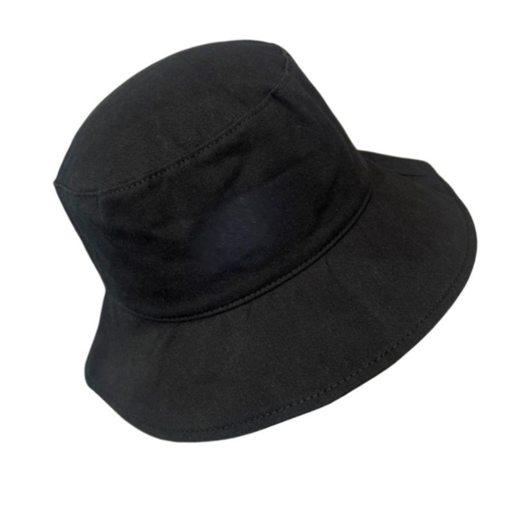 Black cotton wide brim bucket hat made from soft fabric perfect for casual outdoor wear