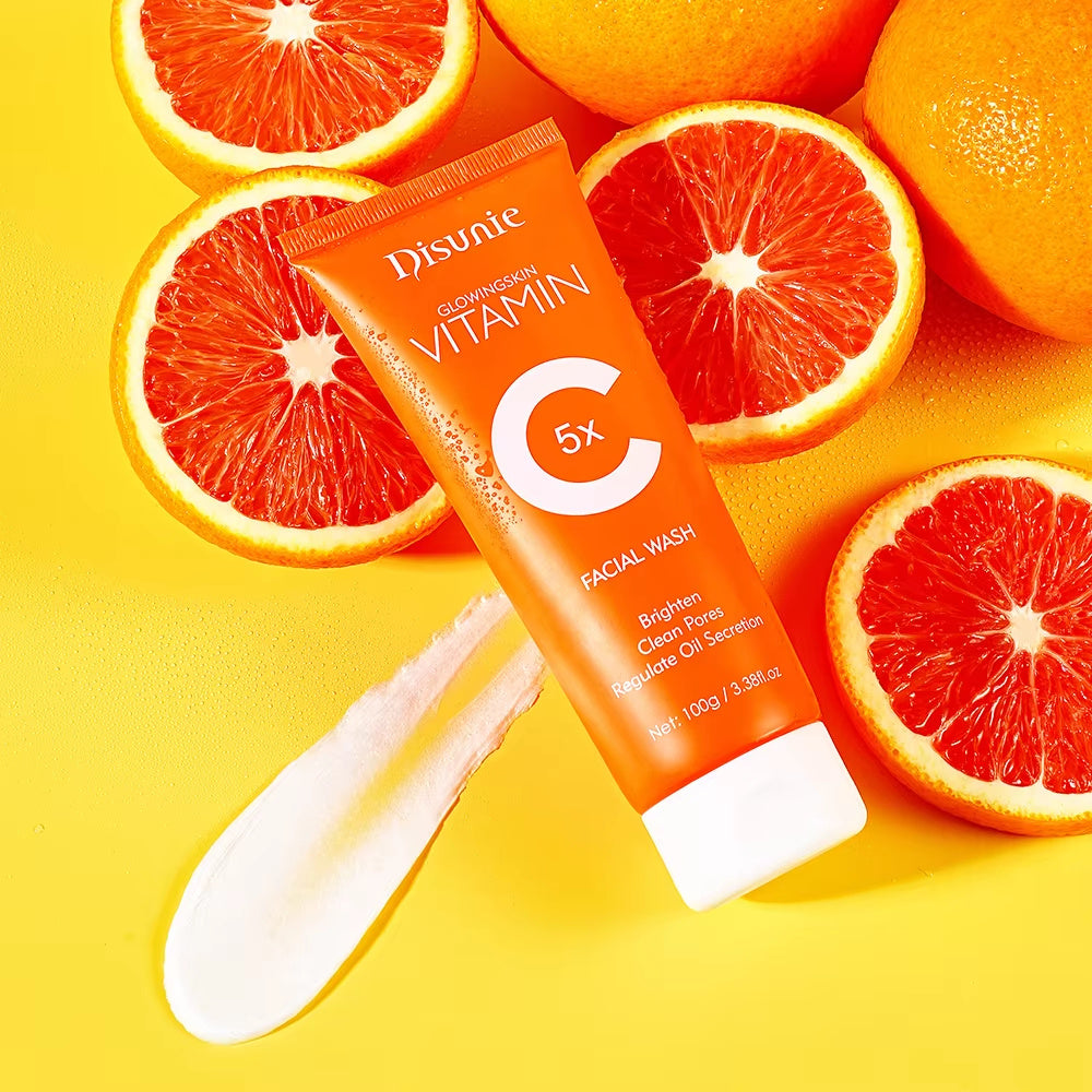 LUNIVA CARE USA vitamin C face wash for glowing skin with fresh oranges and creamy texture on yellow background