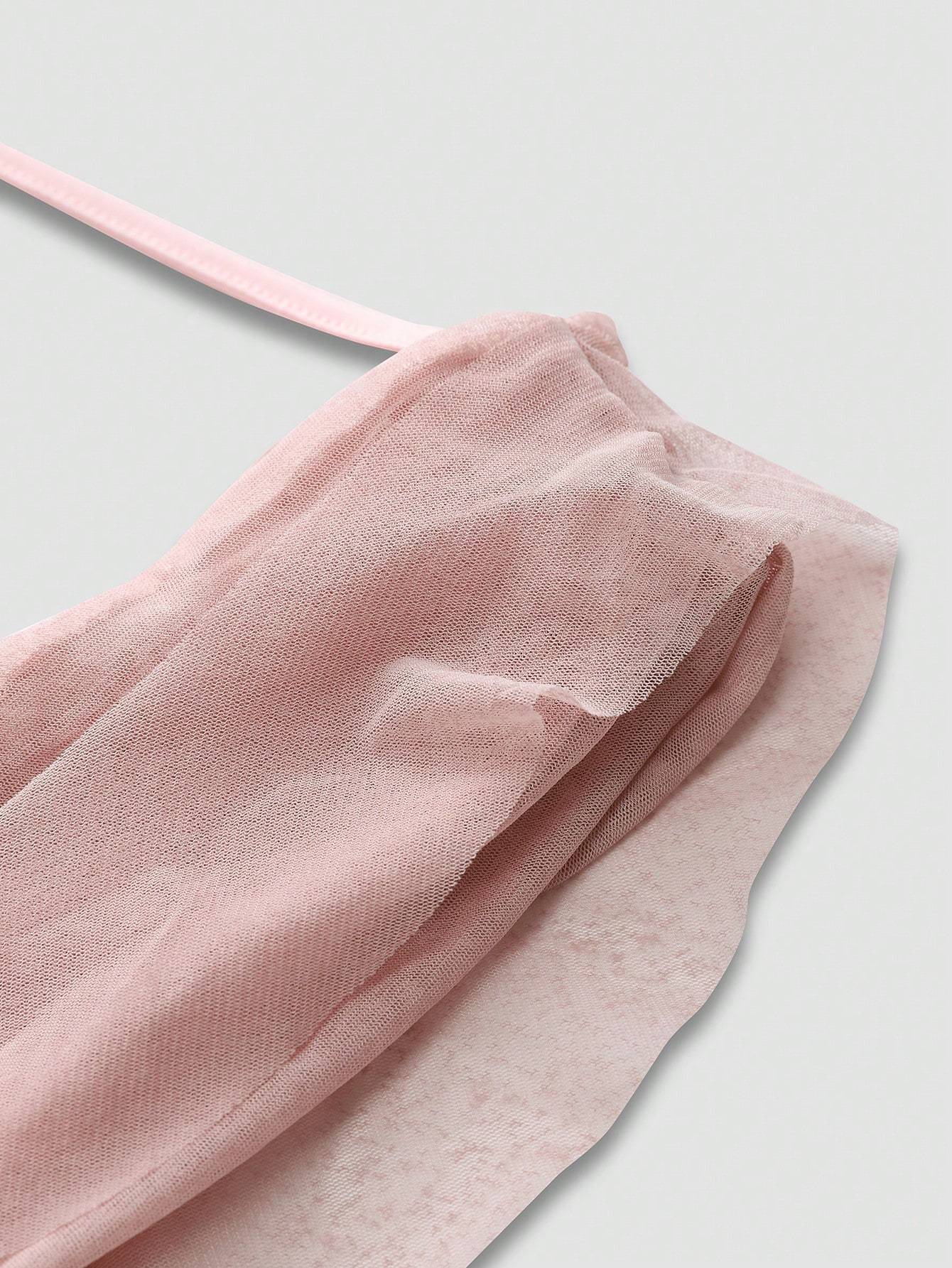 Close-up of delicate pink fabric detail for elegant wedding guest dress with soft texture
