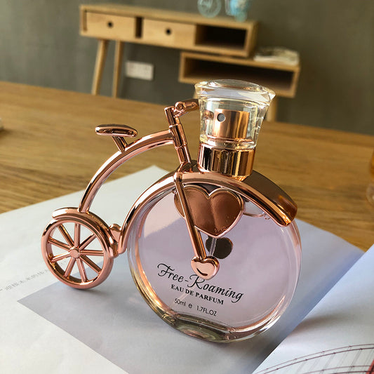 LUNIVA CARE USA unique gift perfume for her with floral fragrance in a bicycle-shaped bottle