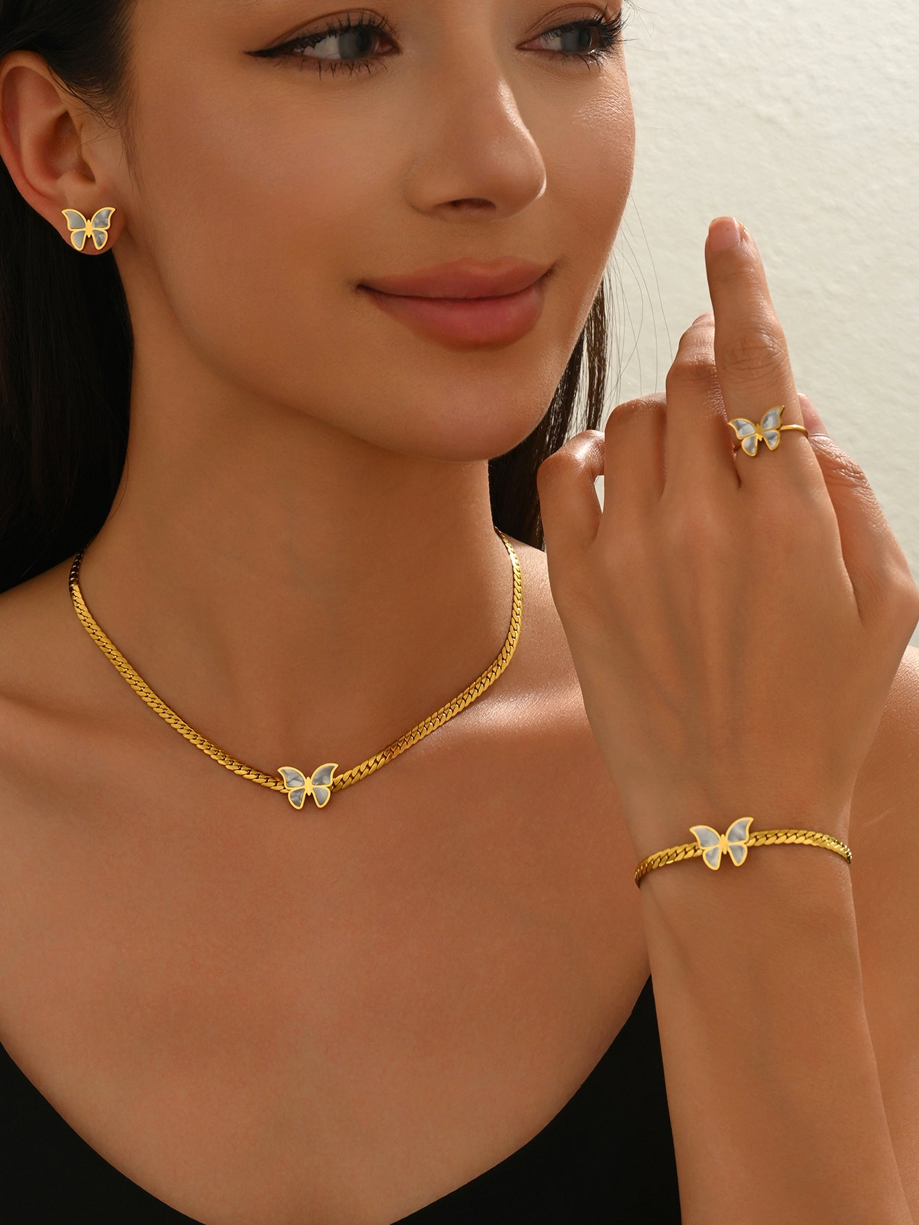 Butterfly jewelry gift set for her with gold-plated necklace, bracelet, ring, and earrings by LUNIVA CARE USA
