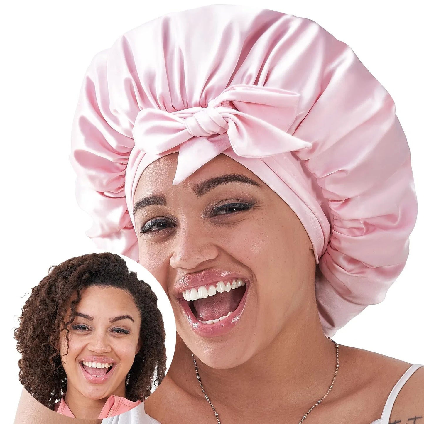 Luniva Care USA silk satin sleep bonnet in light pink worn by a smiling woman with curly hair