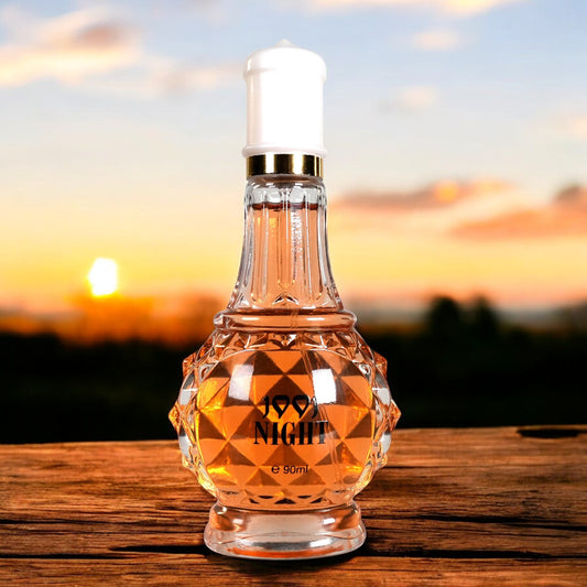 LUNIVA CARE USA luxury self-care perfume for women in a faceted glass bottle with sunset background