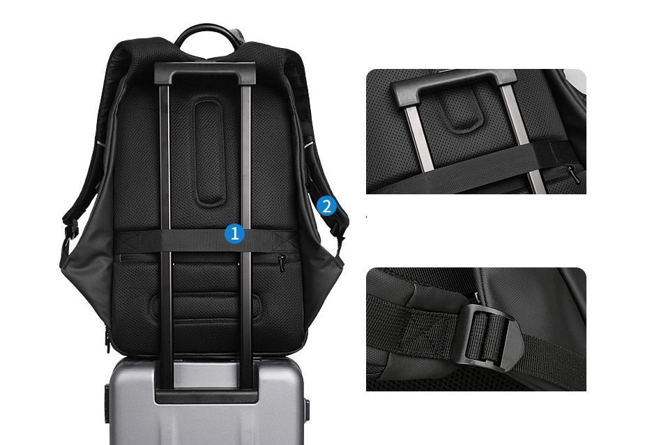 Black Oxford cloth laptop backpack with padded back and adjustable straps shown on luggage handle