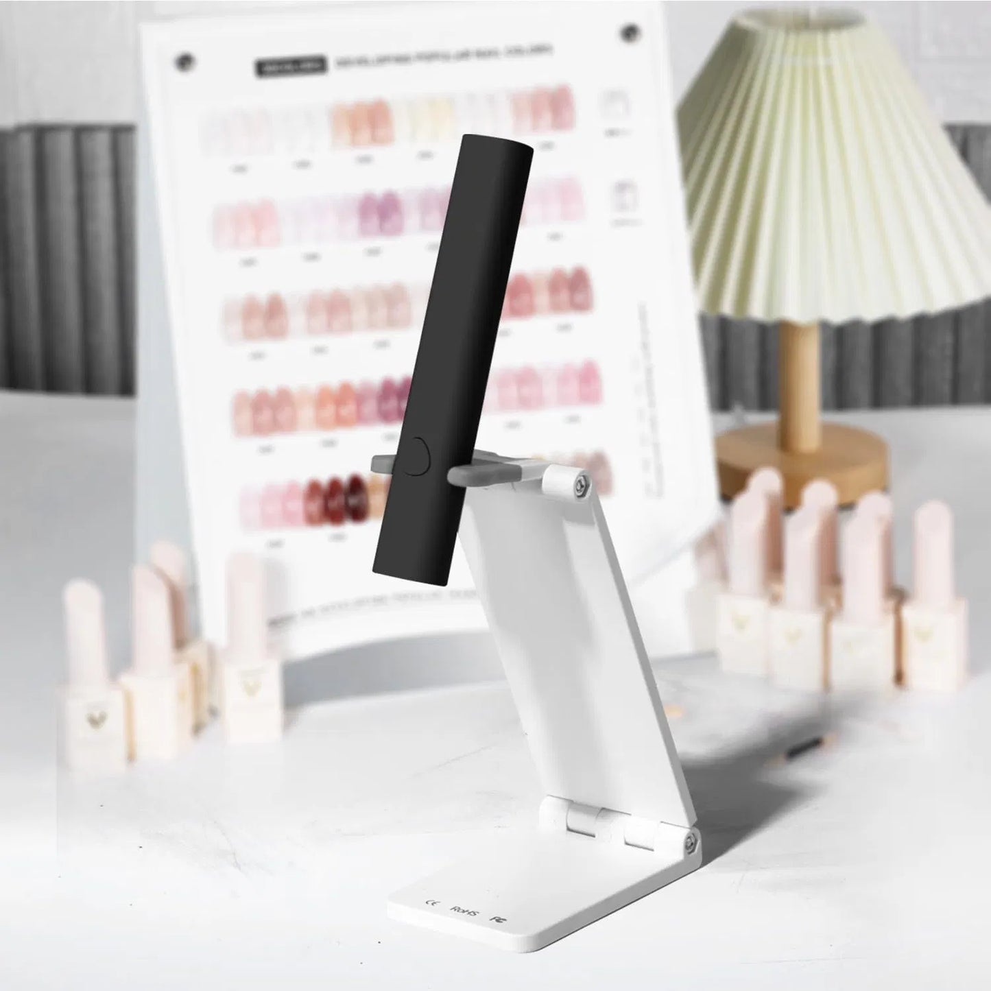 LUNIVA CARE USA mini UV LED nail lamp with adjustable black and white design on a table