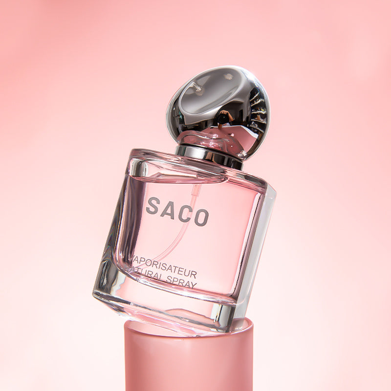 LUNIVA CARE USA SACO unisex luxury self-care perfume in clear glass bottle with silver cap and pink liquid