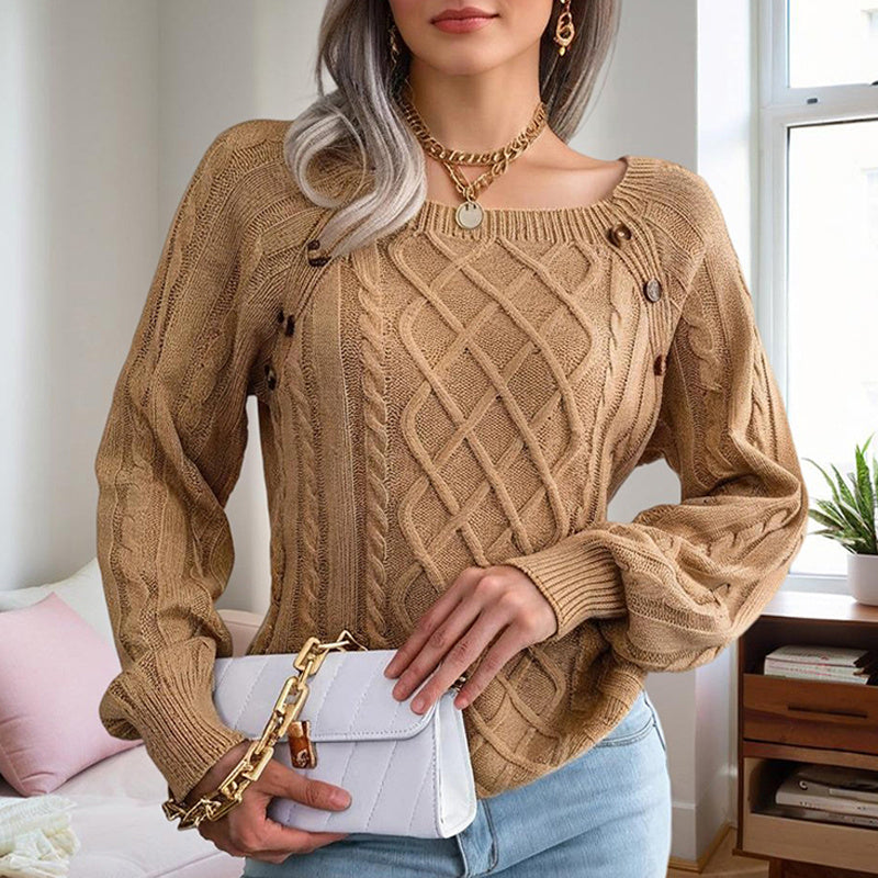 Woman wearing a solid color pullover sweater women in camel with cable knit design and button details