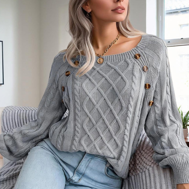 Gray solid color pullover sweater women with cable knit pattern and button details worn with light blue jeans