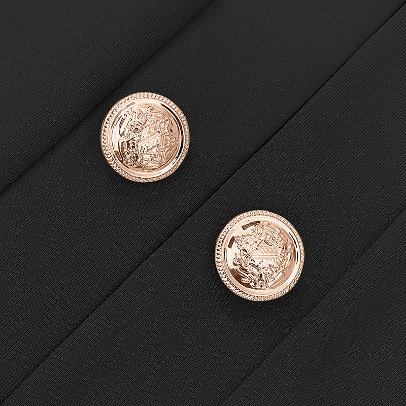 Close-up of 14K gold electroplated Gothic buttons on black fabric for plus size women's blazer
