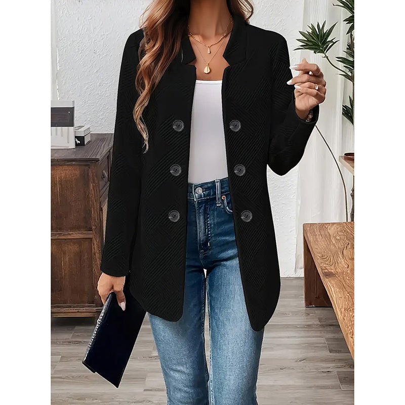 Black women's open front blazer jacket with button details styled with white top and blue jeans