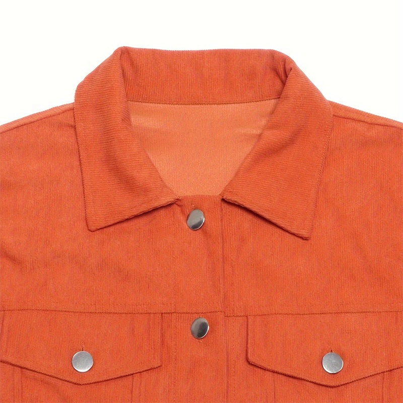 Close-up of orange women's corduroy jacket with silver snap buttons and collar detail