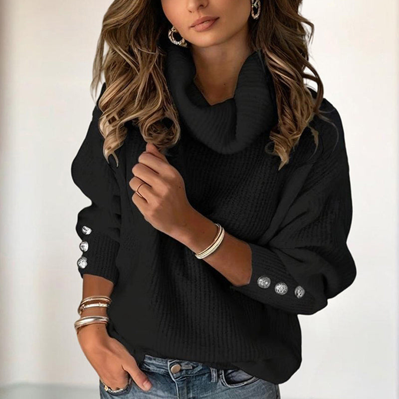 Black women's high neck sweater with button details on sleeves and relaxed fit styling