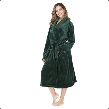 Woman wearing dark green women's winter flannel bathrobe with belt and long sleeves
