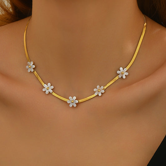 18k gold plated flower necklace from LUNIVA CARE USA featuring delicate white flower charms on a gold chain