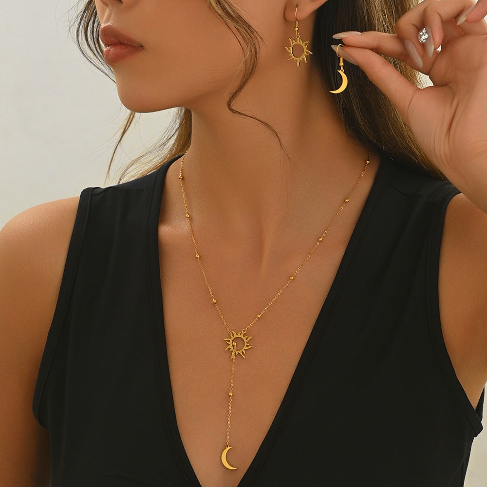 18K gold sun and moon jewelry set featuring a delicate necklace and matching earrings by LUNIVA CARE USA