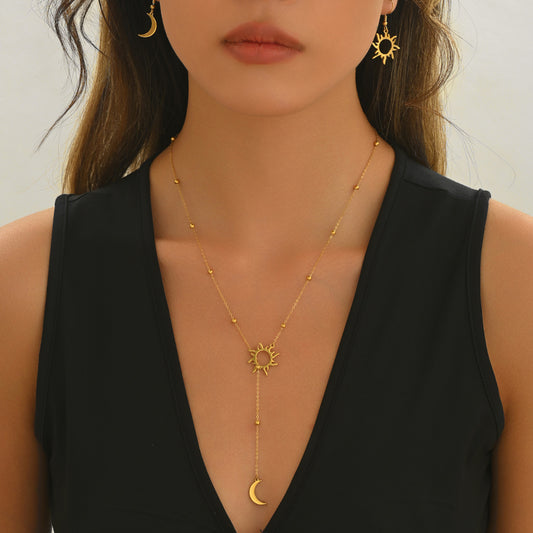 18K gold sun and moon jewelry set with delicate celestial necklace and matching earrings
