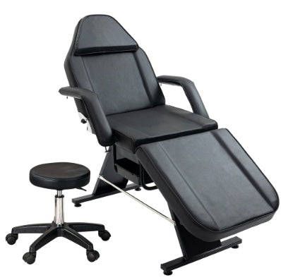 LUNIVA CARE USA professional massage tattoo chair in black with adjustable armrests and matching rolling stool