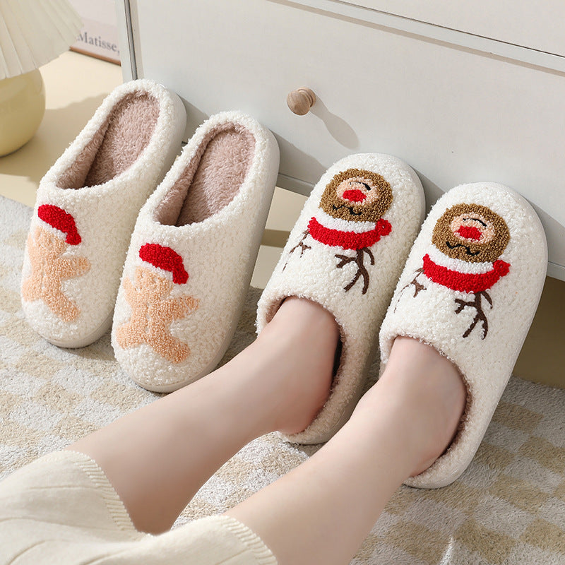 Cozy Christmas Santa slippers for couples with soft plush lining and festive reindeer and gingerbread designs