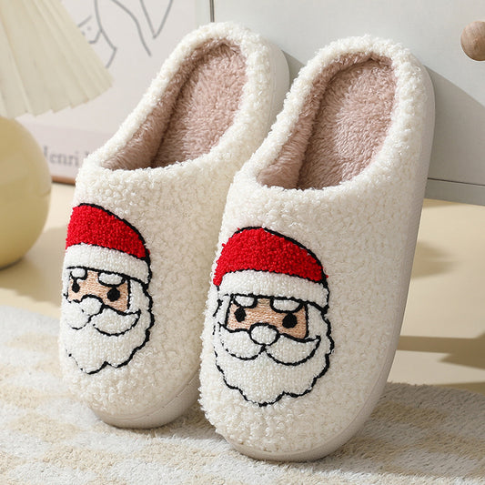 Christmas Santa slippers for couples in white with fuzzy texture and embroidered Santa face design