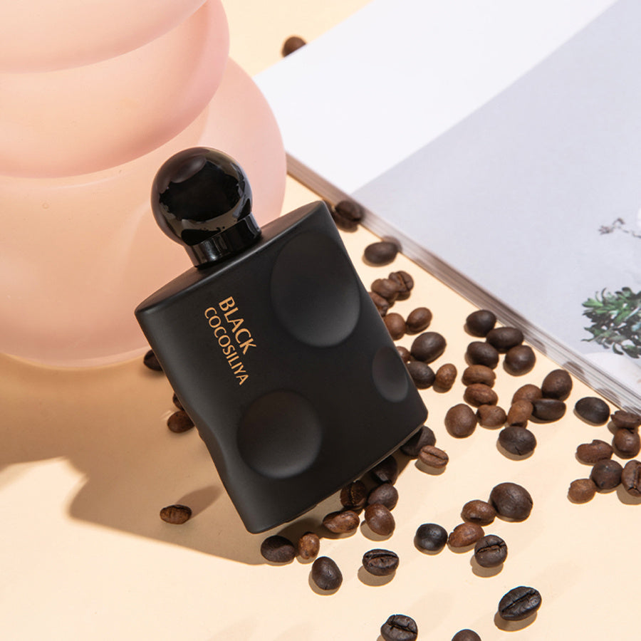 LUNIVA CARE USA Black Cocosilva niche perfume bottle surrounded by coffee beans best perfume for seductive presence