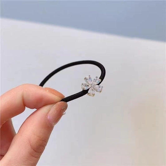 LUNIVA CARE USA delicate crystal flower hairband for women with black band and sparkling flower accent