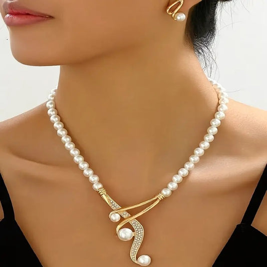 Elegant pearl jewelry for women featuring a gold-accented pearl necklace and matching pearl earring set