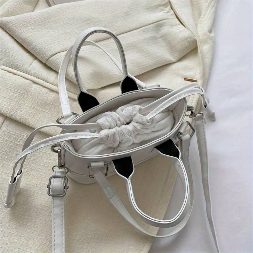 Elegant top handle clutch bag by LUNIVA CARE USA in white with dual handles and adjustable strap