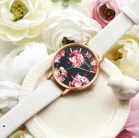 Luniva Care USA rose gold quartz watch for women with floral dial and white leather strap