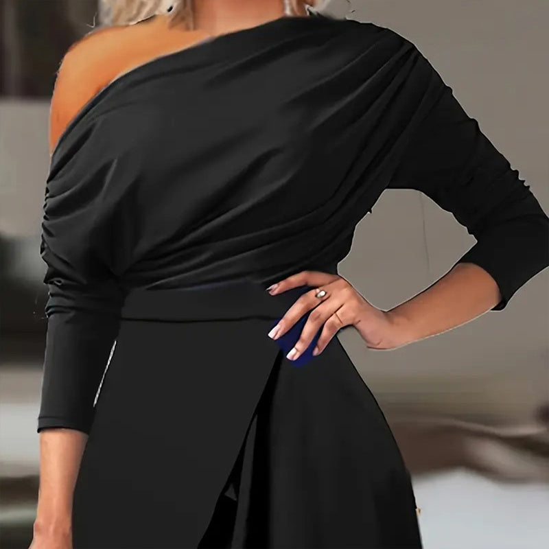 Black formal party jumpsuit with pants slit featuring one shoulder and long sleeves