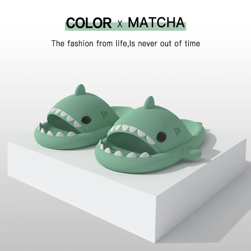 Funny shark slippers for adults in matcha green color with open mouth design and teeth details