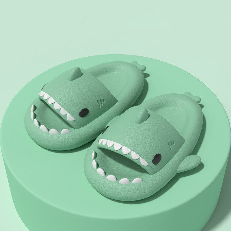 Mint green funny shark slippers for adults with open mouth and fin details on soft sole
