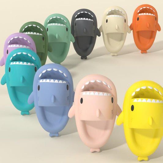 Colorful funny shark slippers for adults in various pastel and bright colors with open mouths and fins