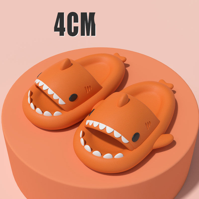 Orange funny shark slippers for adults with open jaws and teeth design on round platform