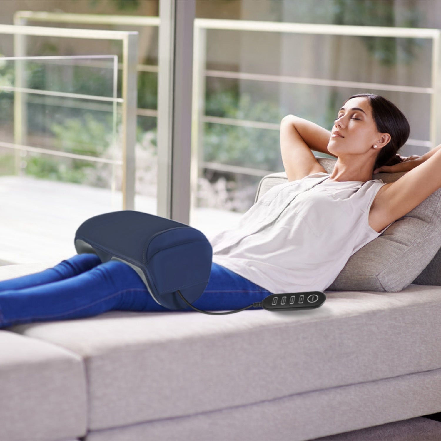 LUNIVA CARE USA home foot and leg massager machine in use with remote control on woman relaxing on sofa