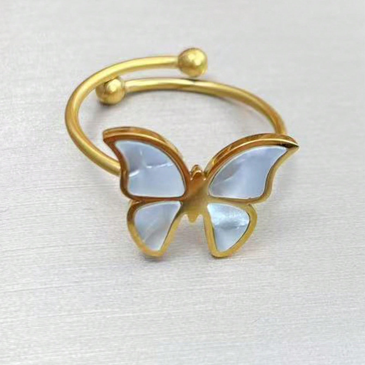 Gold-plated butterfly ring with white enamel detail from butterfly jewelry gift set for her by LUNIVA CARE USA