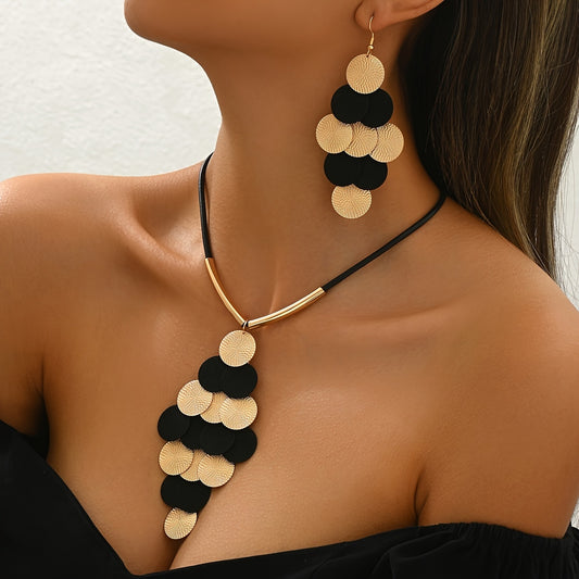 14K gold handmade necklace and earrings set featuring black and gold circular discs on black cord