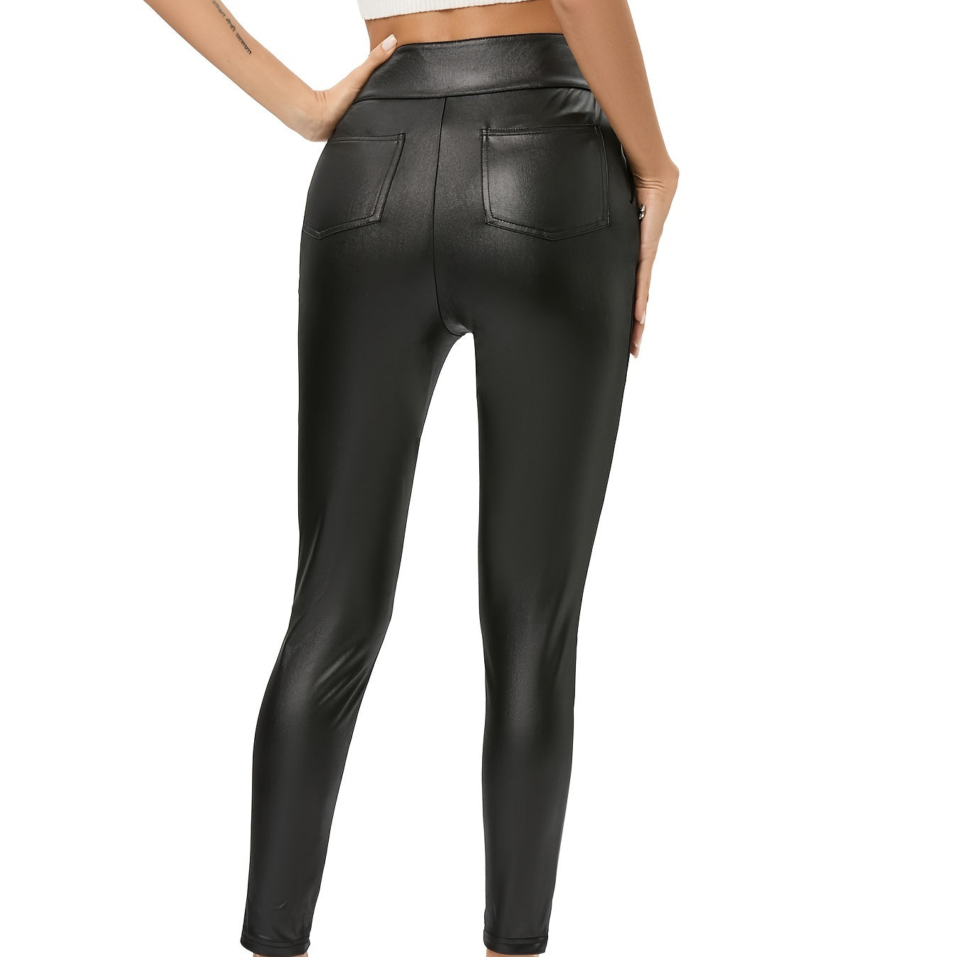 Black high waisted slimming pants for women with back pockets in faux leather style