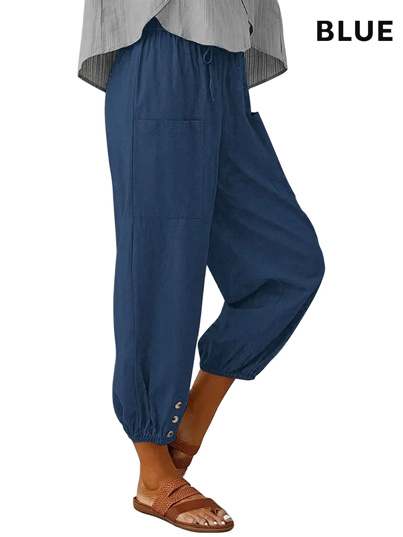 Blue high waisted wide leg cropped pants with elastic cuffs and side pockets for casual wear