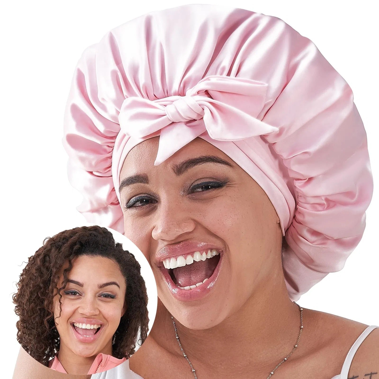 Luniva Care USA silk satin sleep bonnet in light pink worn by a smiling woman with curly hair