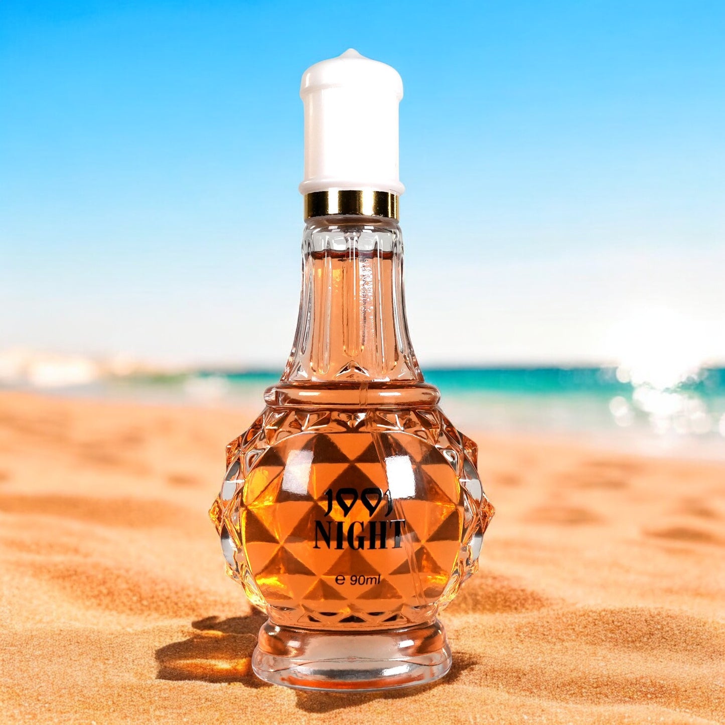 Luxury self-care perfume for women by LUNIVA CARE USA in elegant faceted glass bottle on sandy beach