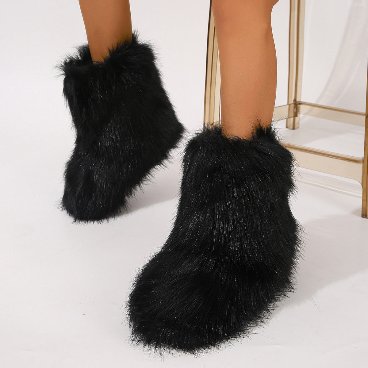 Black furry personalized winter boots for women with soft plush exterior and comfortable fit
