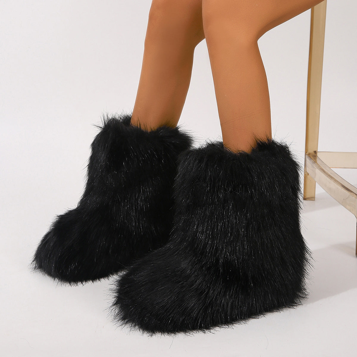 Black furry personalized winter boots for women with a plush soft texture
