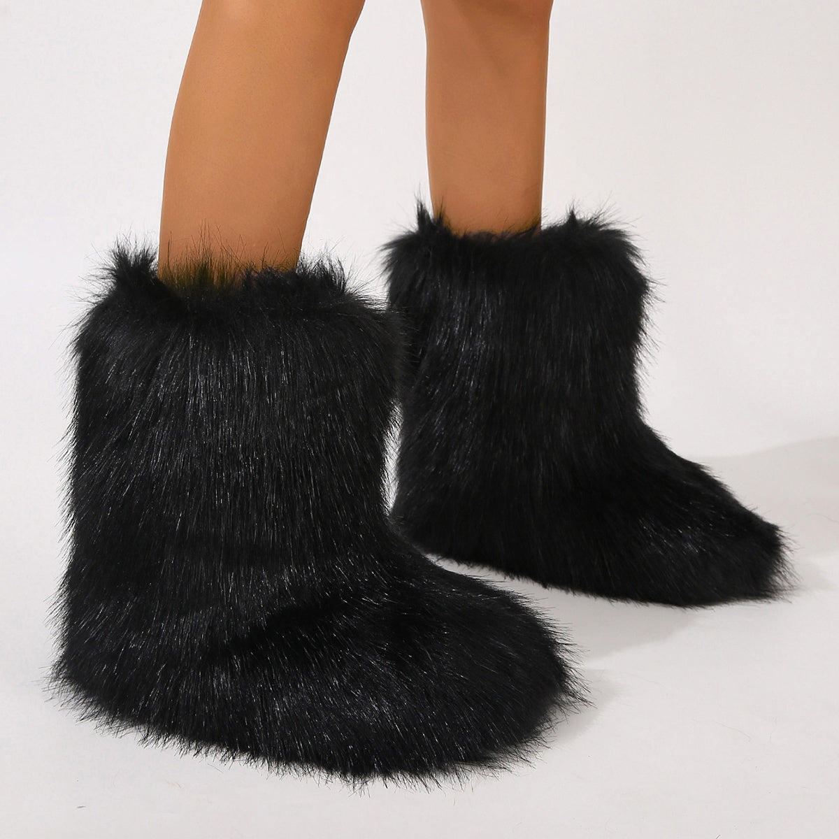 Black furry personalized winter boots for women with soft plush texture covering feet and ankles