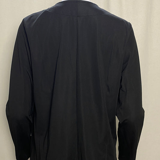 Back view of a black plus size blazer for women with long sleeves and simple design