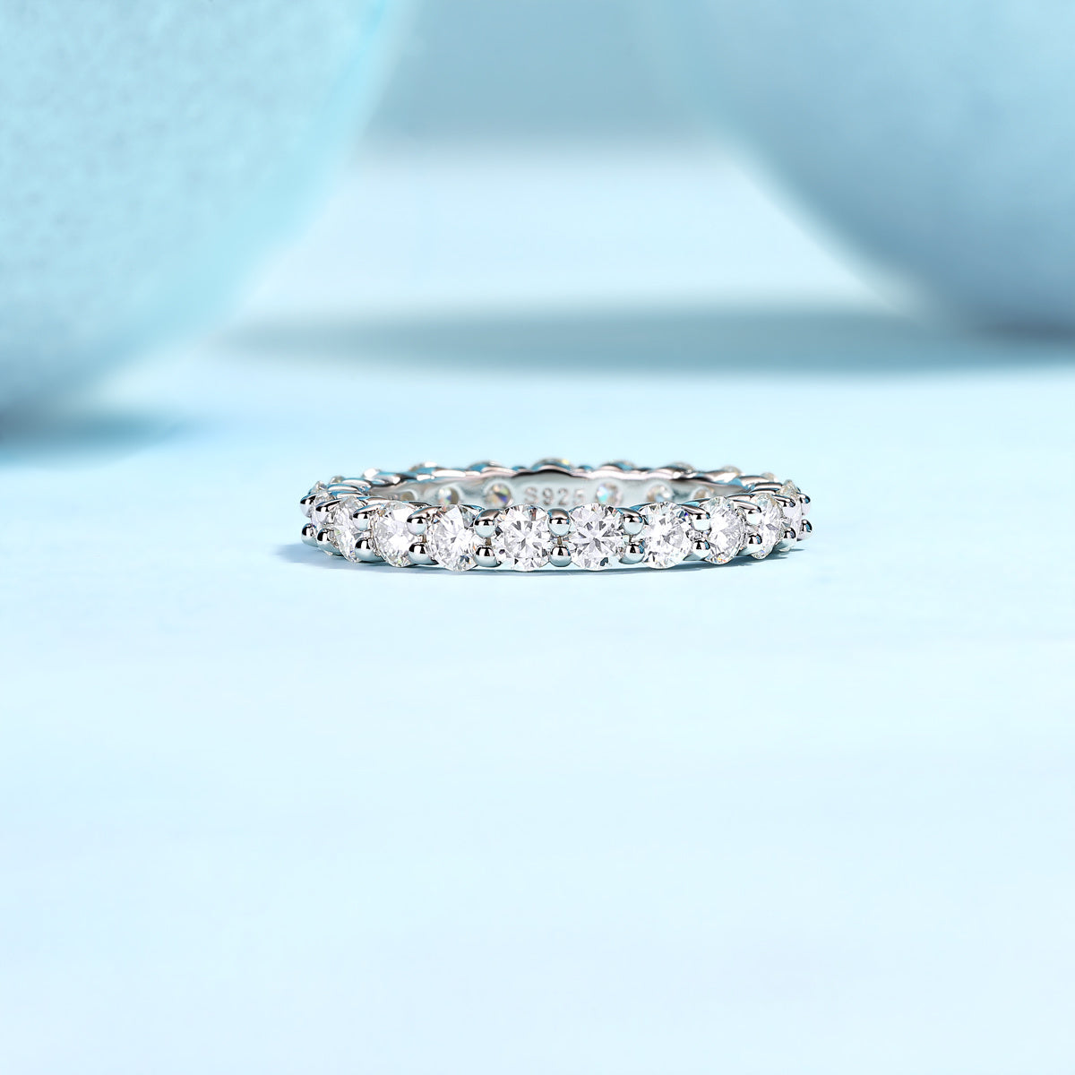 925 sterling silver moissanite ring featuring sparkling round-cut stones in an eternity band design