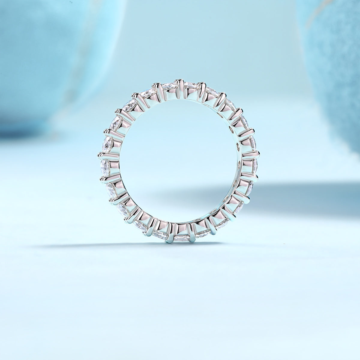 925 sterling silver moissanite ring with round stones set all around band by LUNIVA CARE USA