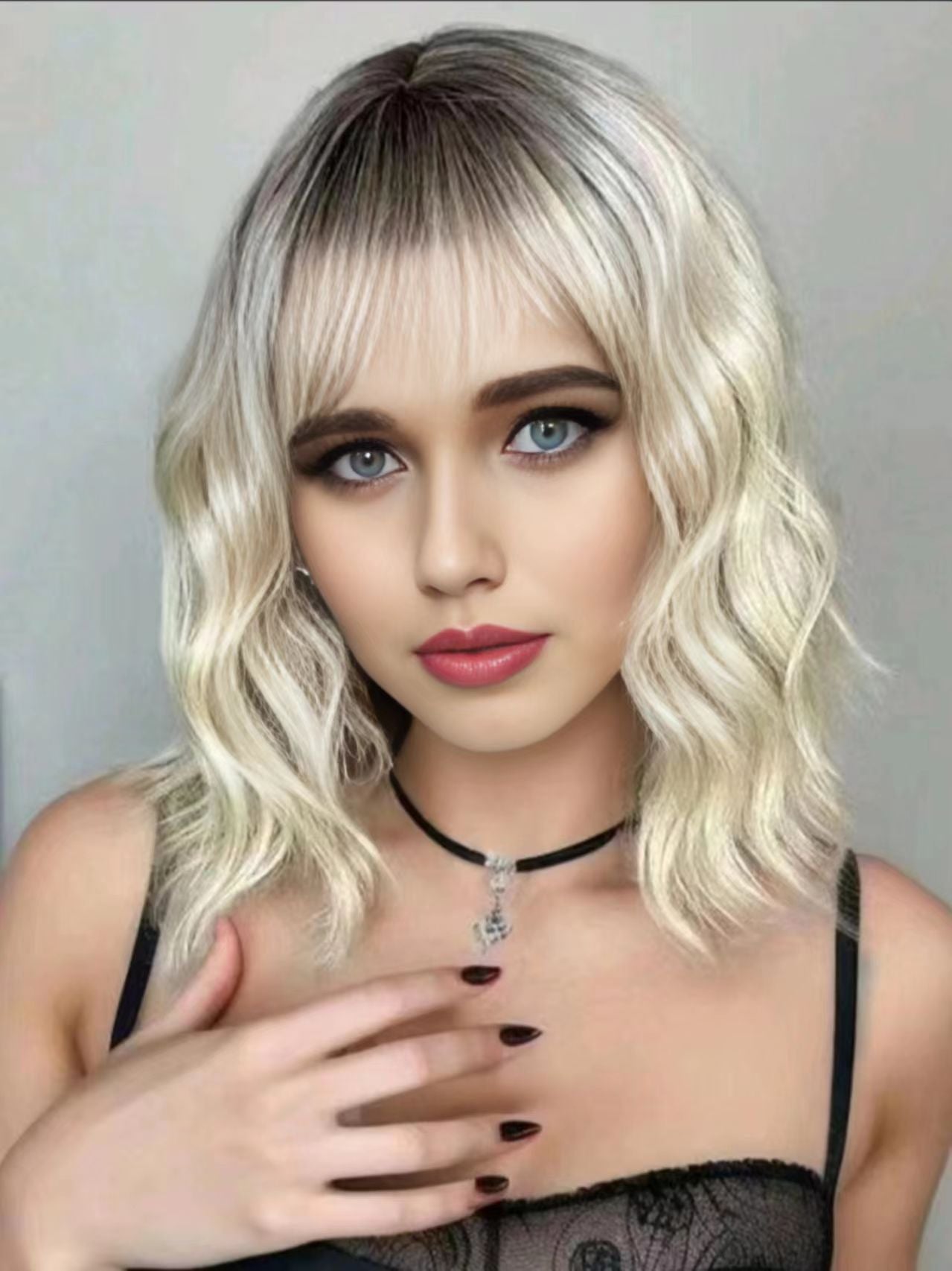 LUNIVA CARE USA short wavy synthetic wig with bangs in blonde with dark roots